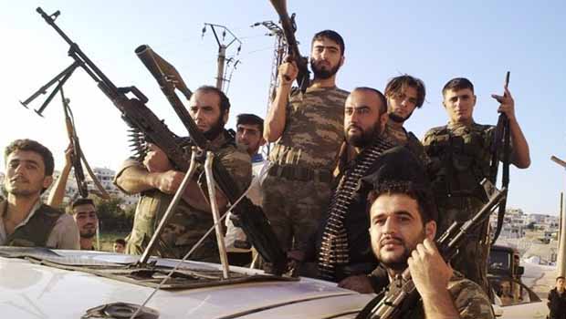 Suriye:Savaş'an gruplar Şam Kolordusu' adıyla tek çatı altında toplandı.