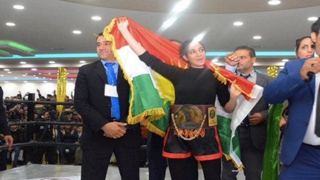 Doğu Kürdistanlı sporcu Kürdistan bayrağı açtığı için tutuklandı