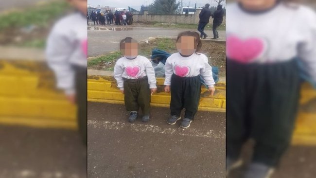 Polis, yöresel kıyafet giyen 5 yaşındaki ikiz çocukları karakola götürüp, parmak izlerini aldı